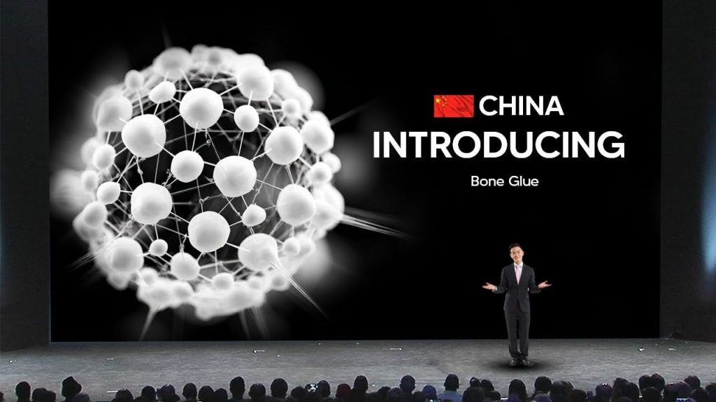 Close-up of Bone-02 adhesive being applied to a fractured bone, showcasing its innovative healing properties